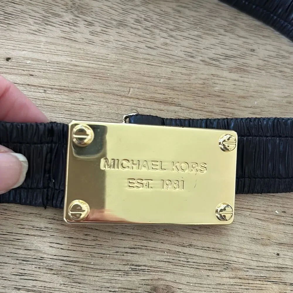 Michael Kors classic logo black and gold belt size small/medium